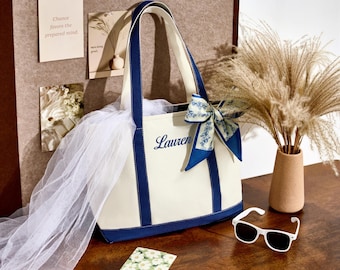 Bolsa de lona bordada: Bolsa estilo barco personalizada com inicial e zíper.