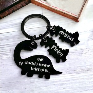 This Daddy Saurus Belongs To... Rectangle Polished Personalised Keychain. Fathers Day Gift, The Perfect Gift For Dad.