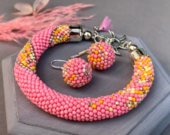 Yellow pink Cuff bracelet, Beaded rope bracelet, Flower toggle clasp and pink tassel bracelet, Unique present for girls