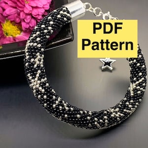 May include: Black and silver beaded bracelet with a star charm. PDF Pattern.