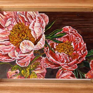 May include: A painting of pink peonies with yellow centers, set against a dark brown background. The flowers are arranged in a cluster, with their petals overlapping and creating a sense of depth. The painting is done in a realistic style, with attention to detail in the texture of the petals and the leaves.