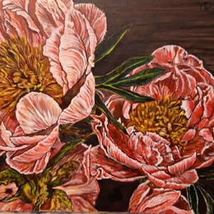 May include: A painting of pink peonies with yellow centers on a dark brown background. The peonies are in full bloom and have a soft, delicate texture.