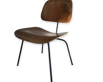 DCM chair designed by Charles and Ray Eames for Herman Miller First Generation