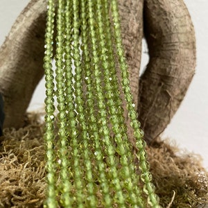 Peridot strand, beads, faceted, 4 mm - S2