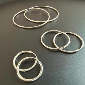 Pendientes de aro de plata de ley 925, 1,5 mm de grosor, varios tamaños, cerrados.