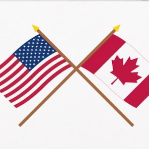 May include: Two flags crossed, the American flag with red and white stripes and white stars on a blue field, and the Canadian flag with a red maple leaf on a white field.
