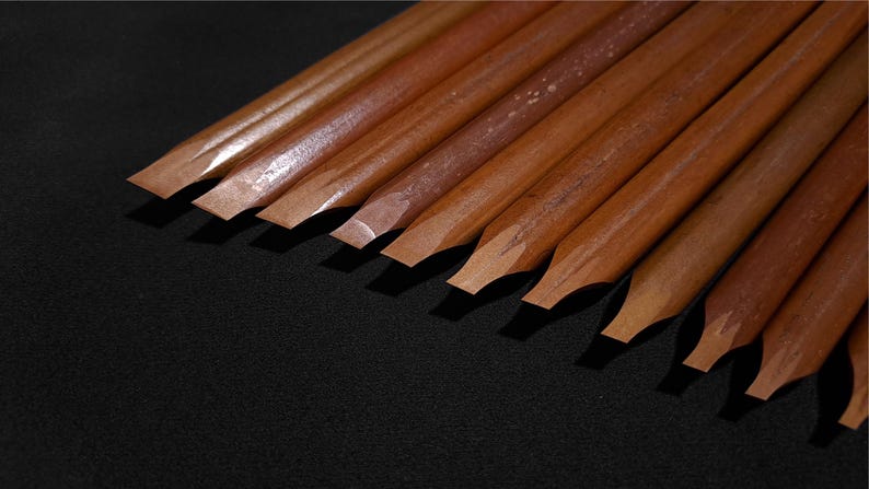 Luxury handmade reed pens with elegant natural textures designed for traditional Arabic calligraphy.