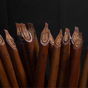 Traditional Handam Bili calligraphy pens crafted for Arabic script and Islamic art lettering.