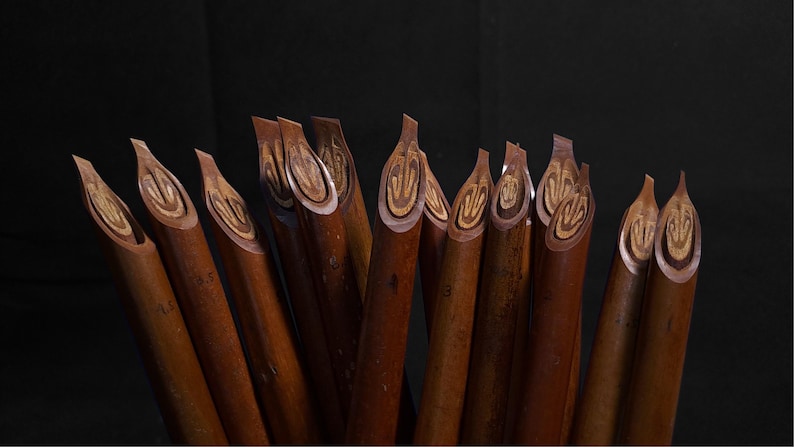 Traditional Handam Bili calligraphy pens crafted for Arabic script and Islamic art lettering.