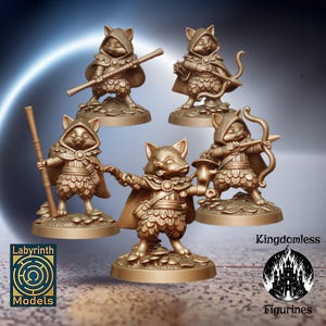 May include: Five miniature figurines of cats dressed as adventurers, each holding a weapon or tool. The figurines are painted in a gold color and are standing on circular bases.