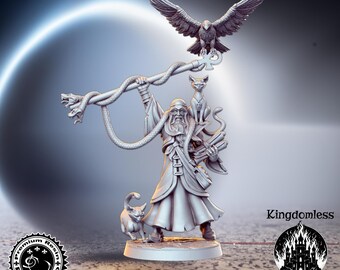 May include: A detailed resin figurine of a wizard holding a staff entwined with snakes, with an eagle perched above. Two cats are at his feet and shoulder. The figurine is labeled "Kingdomless Figurines" and "Premium Resin Studio".