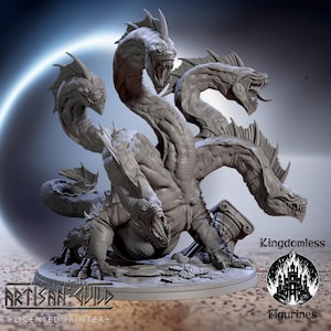 May include: A gray, detailed, 3D printed miniature of a four-headed hydra, a mythical creature with multiple heads, standing on a circular base. The hydra is posed in a defensive stance with its heads raised and mouths open. The base is textured to resemble a rocky surface. The miniature is labeled "Kingdomless Figurines".