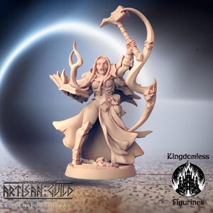 May include: A detailed miniature figurine of a female warrior with a fiery red cape and a weapon in her hand. The figurine is painted in a flesh tone and has a detailed face and clothing. The figurine is standing on a round base.