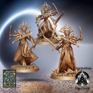 May include: Three gold-colored miniature figurines of a female figure with multiple arms and swords. The figures are posed in dynamic stances and are set on circular bases.