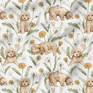 May include: A seamless pattern featuring watercolor illustrations of golden retriever puppies and dandelions on a white background.