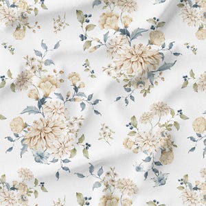 May include: A white fabric with a repeating floral pattern. The design features beige and cream-colored flowers with blue-green leaves and small dark blue berries. The flowers are clustered in bouquets.