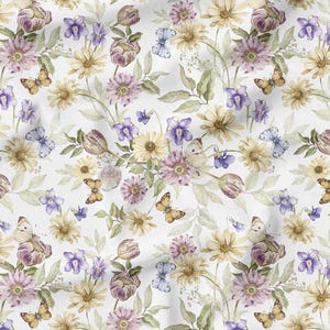 May include: A white fabric with a watercolor floral pattern. The design features yellow daisies, purple tulips, and lavender flowers, along with butterflies in shades of yellow and blue. Green leaves and stems complete the botanical theme.