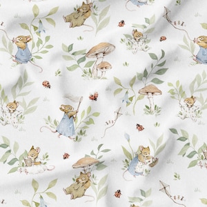 May include: White fabric with a repeating pattern of watercolor illustrations. The design features mice in various poses, mushrooms, green foliage, ladybugs, and kites. The mice are dressed in blue and beige clothing, creating a whimsical, nature-themed design.