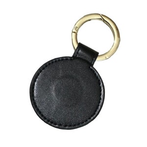 Clip magnétique multifonctionnel pour chapeaux, sacs ou accessoires portables. Durable, sûr, portable, idéal pour les voyages. Noir