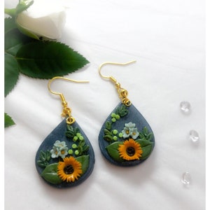 Sunflowers and blossom on Slate blue Teardrop Dangle Drop Earrings. Polymer Clay Embroidery. Jewellery. Gift.