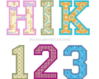 May include: A set of embroidered letters H, I, K and numbers 1, 2, 3. The letter H features a cream background with animal prints, I has a blue floral pattern, K is orange with flowers. Number 1 is geometric, 2 is pink plaid, 3 is blue with dots.
