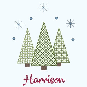 May include: A Christmas-themed design featuring three green stylized trees with a white and green pattern, surrounded by blue snowflakes and blue dots. The name "Harrison" is written in red cursive at the bottom of the design.