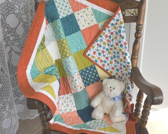 Gender Neutral Baby Quilt "Well Said" by Moda with colors in Blue Green Orange