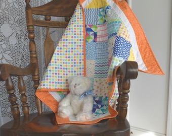 Gender Neutral Baby Quilt "Confetti" by Moda with colors in Pink Blue Purple Green Orange Yellow