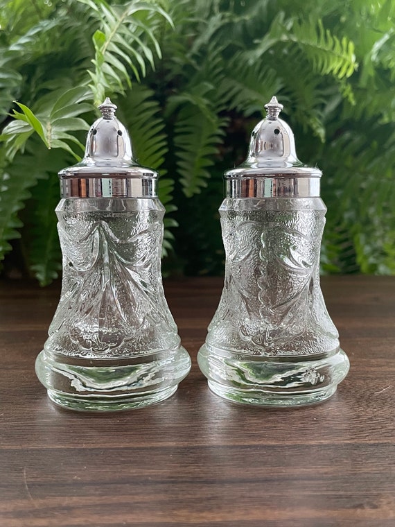 Three Sets of VInTAGE clear glass fancy salt and pepper shakers