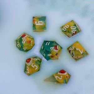 cute duck dice with tiny christmas hat, Handmade sharp edged resin dice set for role playing games like Dungeons and Dragons