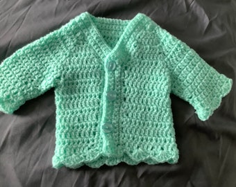 Crotchet cardigan in a pale green