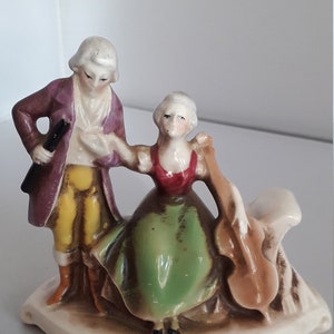 Early Goebel baroque figurine group.. impressed on base. 4&quot; wide