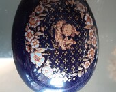 Limoges Egg shaped trinket box deep blue with gold detailing