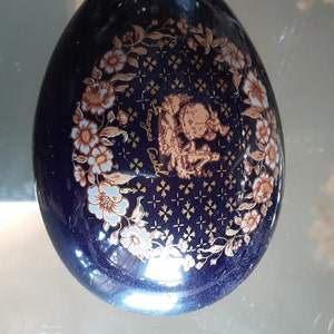 Limoges Egg shaped trinket box.. deep blue with gold detailing