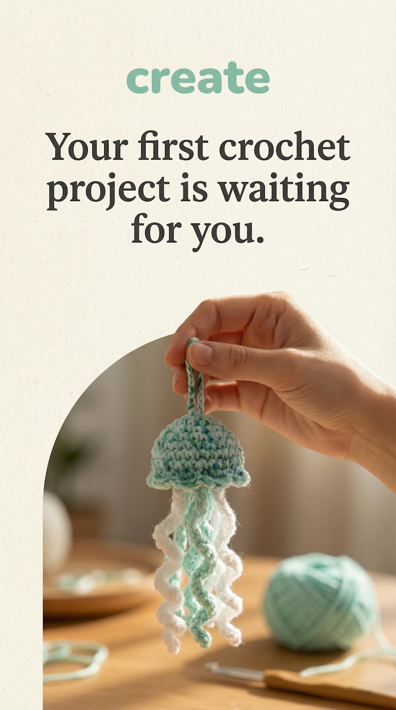 May include: A teal and white crocheted jellyfish is displayed. The jellyfish has a rounded top and curly tentacles. The image also includes the text "create" and "Your first crochet project is waiting for you."