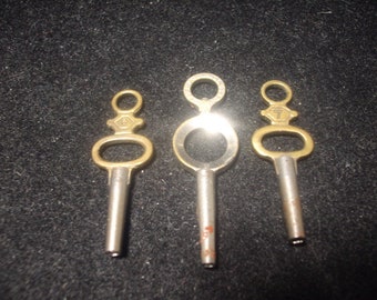 Three Tiny Metal Pocket Watch Keys From the 1880s