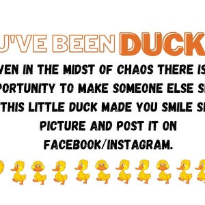 Puede incluir: Un pato amarillo de dibujos animados con el texto "YOU'VE BEEN DUCKED!" encima. El texto debajo del pato dice "Even in the midst of chaos there is an opportunity to make someone else smile. If this little duck made you smile snap a picture and post it on FACEBOOK/INSTAGRAM."