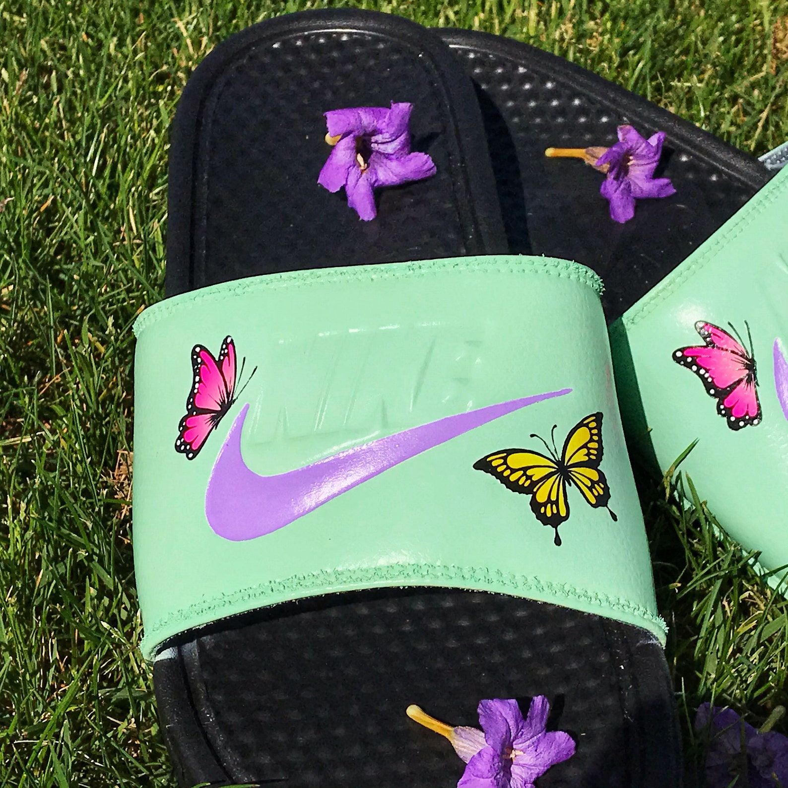 nike slides with butterflies