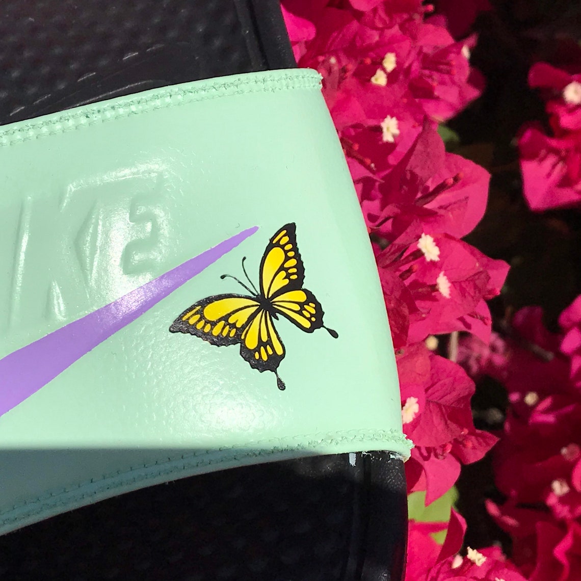 nike slides with butterflies