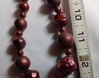 1980's Cranberry Colored Plastic Textured Beaded Necklace, In Vintage Very Good Condition. A High End Look Without The High End Price! Cool!
