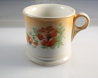 Vintage ongemarkeerde keramische scheermok, oranje en witte kleur, met bloemmotief.  Leuke Shabby Chic-aanwinst of geweldig upcycle-potentieel!