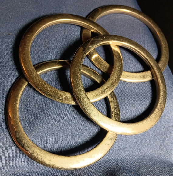 Circa 1970's Set Of 4 Metal Bangles, In Vintage G… - image 1