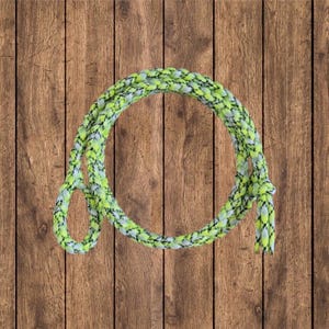 May include: A green and black braided rope with a loop at one end. The rope is coiled into a circle and is lying on a wooden surface.