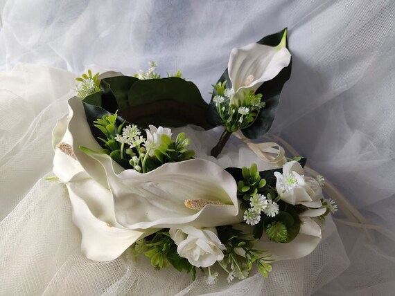 Bridal white zantedeschia flower crown and groom's bouquet.