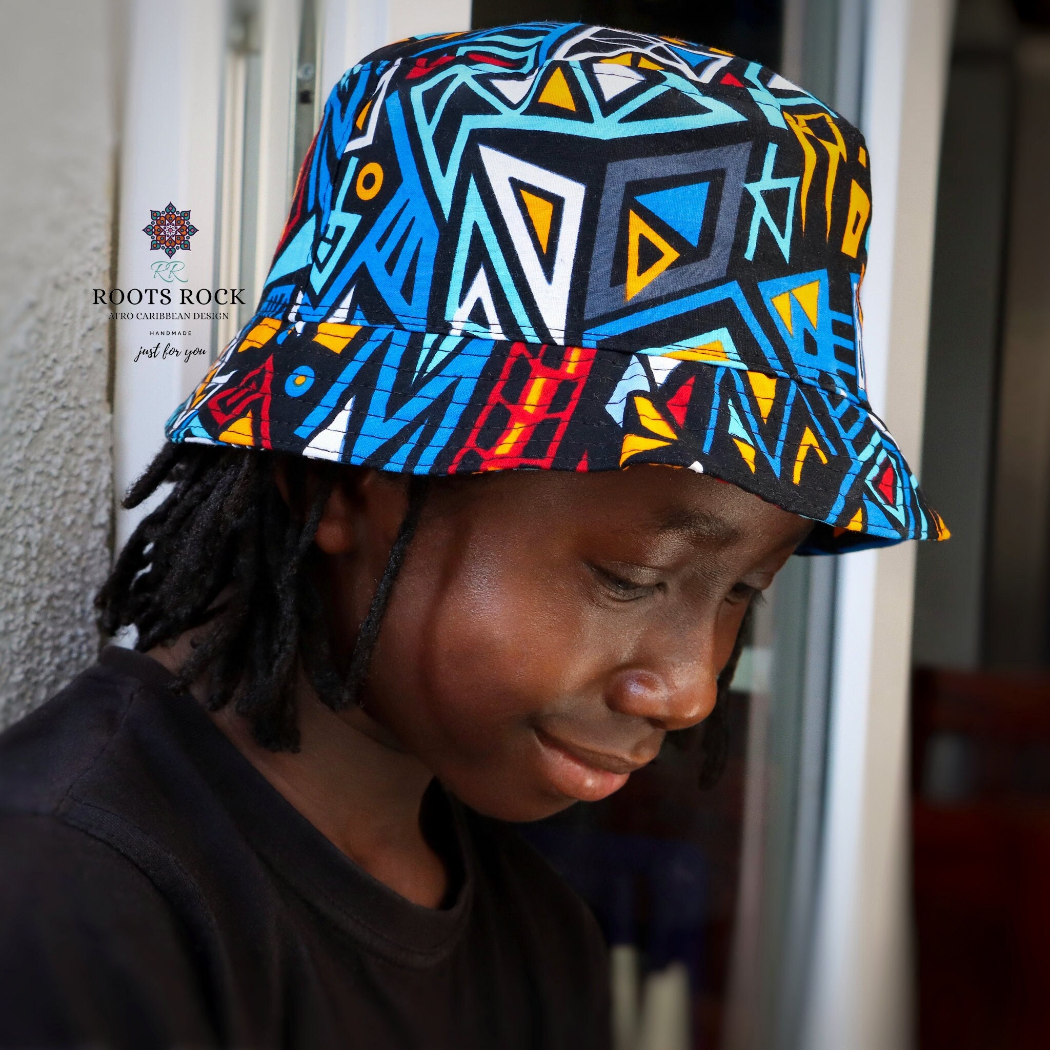 Bucket hat / Fisherman hat with African print - Multi color Kente purp –  AfricanFabs