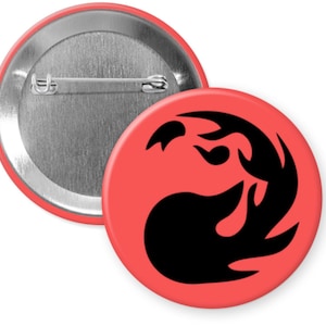 May include: A red button with a black flame symbol. The button has a silver back with a safety pin.