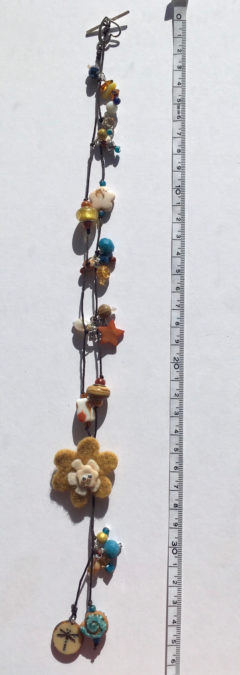 Beaded Necklace with Felt Flower in Mustard and Blue