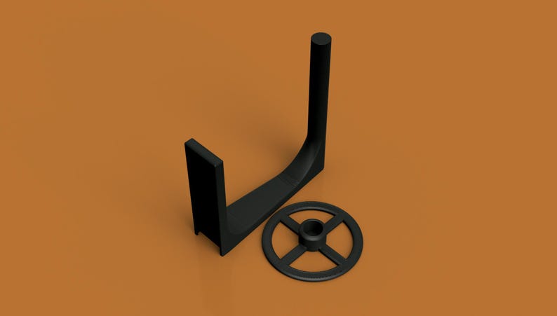 May include: Black metal stand with a curved arm and a round base. The stand is designed to hold a plate or other object.