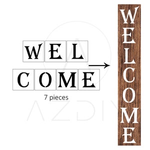 May include: A wooden sign with the word "WELCOME" spelled out in white letters. The letters are arranged in a staggered pattern, with the word "WELCOME" spelled out vertically on the right side of the sign and horizontally on the left side of the sign.