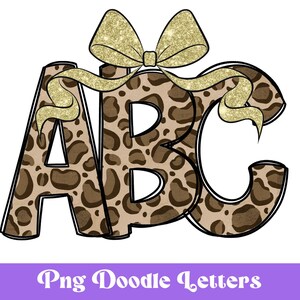 May include: ABC letters in a leopard print design with a gold glitter bow on top.  The letters are outlined in black.